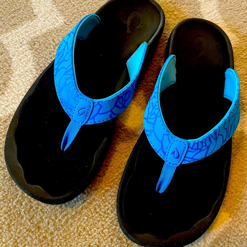 OluKai blue flip flops